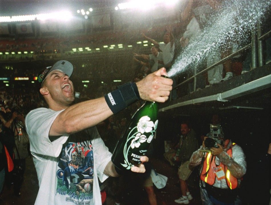 New York Yankees Derek Jeter sprays champagne