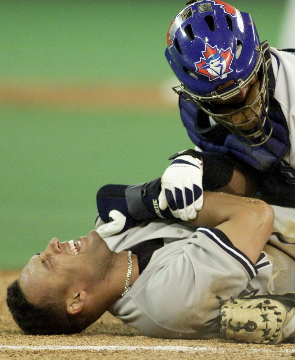 New York Yankees Derek Jeter lies in pain