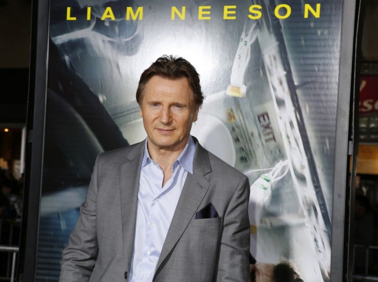 Actor Liam Neeson poses at the premiere of his new film &quot;Non-Stop&quot; in Los Angeles February 24, 2014.