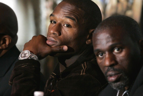 Floyd Mayweather Jr. of the U.S., with his uncle and trainer Jeff Mayweather