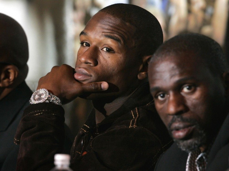 Floyd Mayweather Jr. of the U.S., with his uncle and trainer Jeff Mayweather