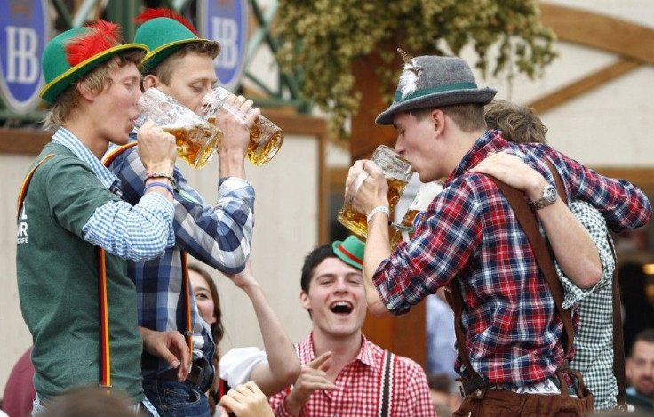 Visitors enjoy beer during their visit to the 181st Oktoberfest in Munich September 28, 2014. Millions of beer drinkers from around the world will come to the Bavarian capital for the Oktoberfest, which runs until October 5.
