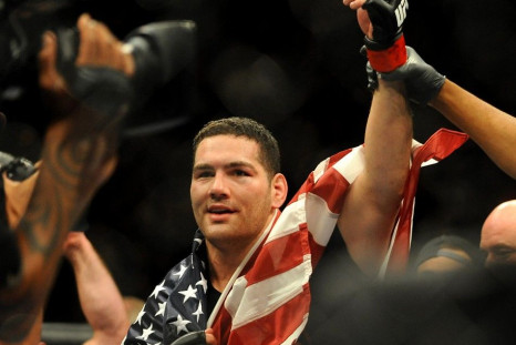 Las Vegas, NV, USA; Chris Weidman celebrates after successfully defending his middleweight title against Lyoto Machida at Mandalay Bay Events Center.
