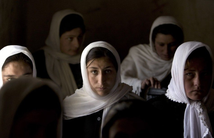 Afghan girls attend a class at the Ishkashim high school for girls in the northeastern province of Badakhshan, near the border with Tajikistan, April 23, 2008.