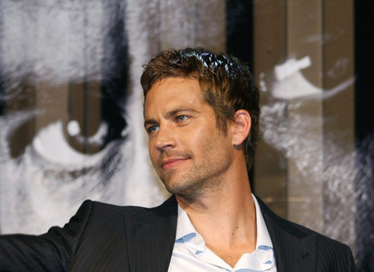 U.S. actor Paul Walker smiles during the premiere of the movie &quot;Fast and the Furious 4&quot;