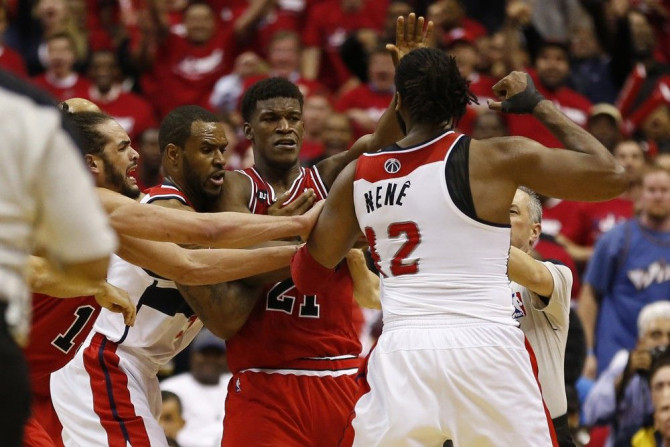 Washington Wizards forward Nene scuffles with Chicago Bulls guard Jimmy Butler