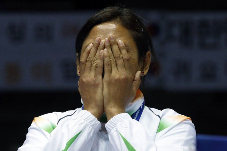 India&#039;s bronze medallist Laishram Sarita Devi reacts