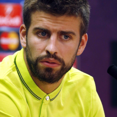 Barcelona's Gerard Pique speaks during a news conference after their training session on the eve of their Champions League match against Apoel at Ciutat Esportiva Joan Gamper training grounds in Sant Joa Despi near Barcelona September 16, 2014.
