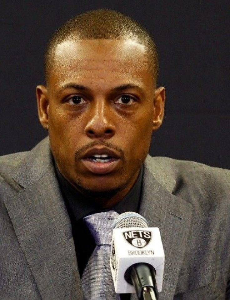 Newly acquired Brooklyn Net&#039;s NBA player Paul Pierce speaks as he is introduced to the media during a news conference in Brooklyn, New York July 18, 2013.