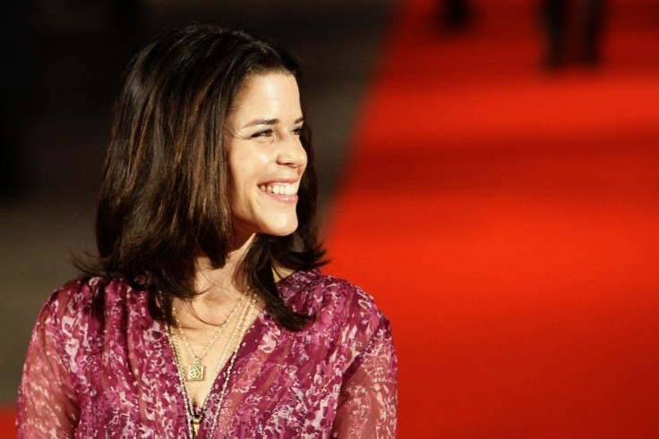 Canadian actress Neve Campbell poses for photographers