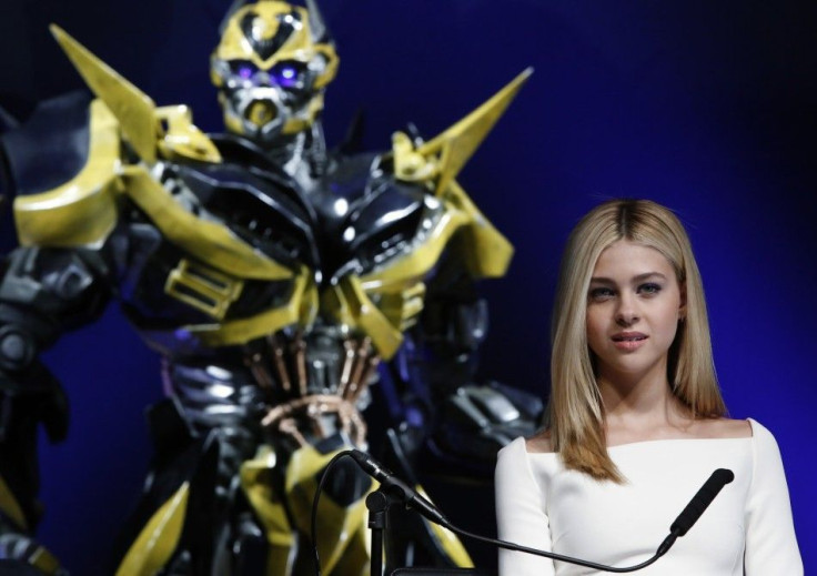 Cast member Nicola Peltz attends a news conference for the movie "Transformers: Age of Extinction"