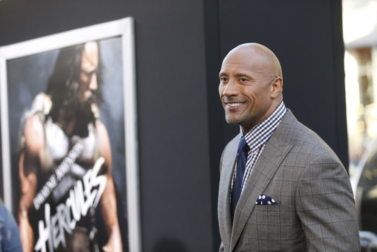Cast member Dwayne Johnson poses at the Los Angeles premiere of &quot;Hercules&quot; in Hollywood, California July 23, 2014.