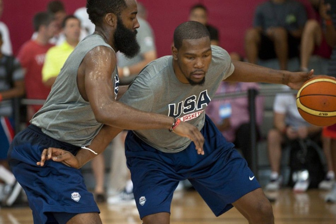 Jul 30, 2014; Las Vegas, NV, USA; Team USA guard Kevin Durant (right) dribbles the ball against guard James Harden (left) during a team practice session at Mendenhall Center.