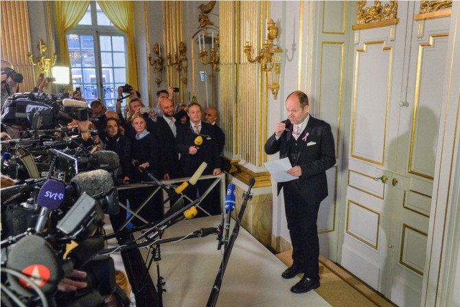 Peter Englund, permanent secretary of the Swedish Academy, steps out of his office to announce French writer Patrick Modiano as the winner of the 2014 Nobel Prize for Literature