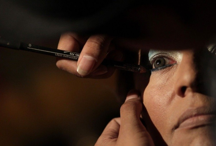 A transsexual contestant gets ready for the beauty pageant &quot;Miss Trans Nuevo Leon&quot; at a bar in Monterrey July 25, 2013. Eleven transsexuals competed in a beauty pageant to raise awareness and promote gender equality, according to local media. Pi