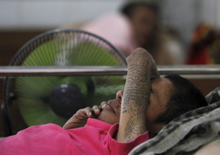 An AIDS patient lies in bed at Buddhist temple Wat Prabat Namphu in Lopburi province, north of Bangkok September 4, 2014. REUTERS/Chaiwat Subprasom