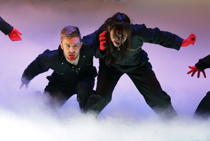 Actors perform during the presentation of the musical &quot;Le Bal des Vampires&quot; (Dance of the Vampires) directed by Polish-French film director Roman Polanski at the Mogador theater in Paris March 17, 2014.