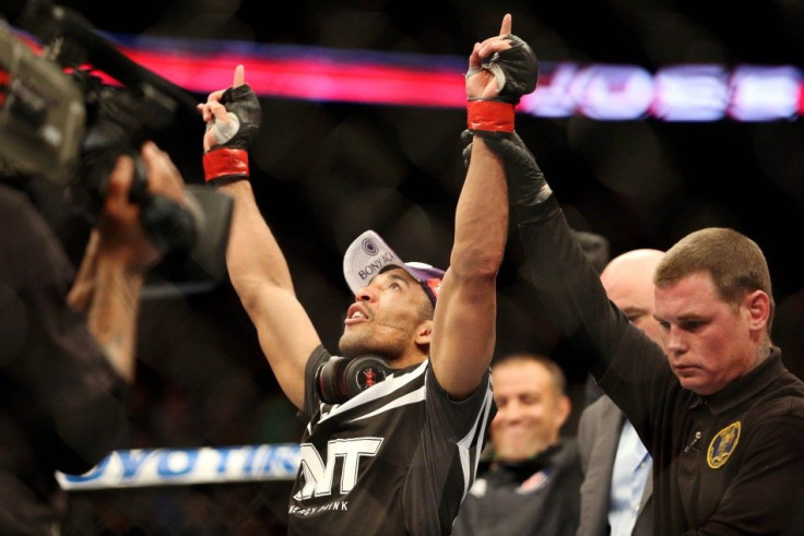 Feb 1, 2014; Newark, NJ, USA; Jose Aldo (red gloves) celebrates beating Ricardo Lamas (blue gloves) during UFC 169 at Prudential Center.