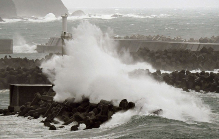 Waves crash as Typhoon Vongfong approaches Japan&#039;s main islands in Kuroshio Town, Kochi prefecture, in this photo taken by Kyodo October 12, 2014. Typhoon Vongfong battered the southern Japanese island of Okinawa on Sunday, injuring 31 people and kno