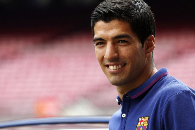FC Barcelona&#039;s Luis Suarez smiles d