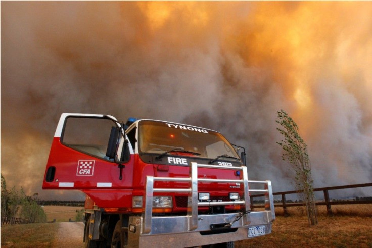 A firetruck is seen as a bushfire approaches the town of Labertouche, 90km (56 miles) east of Melbourne, February 7, 2009.