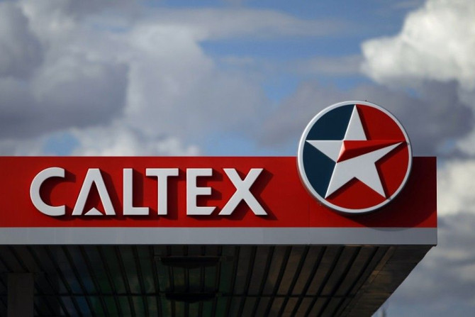 A Caltex sign is seen at a petrol station in Melbourne April 22, 2010. Caltex Australia Ltd, the country's largest refiner, said on Thursday its short-term refiner margin outlook remains challenging, however it was optimistic about its medium to long-term