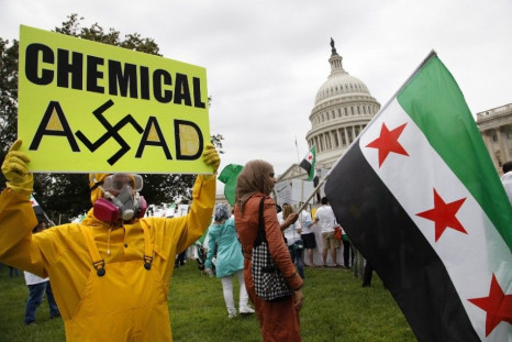 A group of Syrian Americans rally in favor of proposed U.S. military action against the Bashar al-Assad regime, outside the U.S. Capitol in Washington, September 9, 2013. President Barack Obama ramped up an intensive lobbying blitz on Monday to convince a