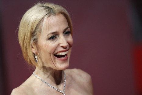 Gillian Anderson arrives at the British Academy of Film and Arts (BAFTA) awards ceremony at the Royal Opera House in London February 16, 2014.