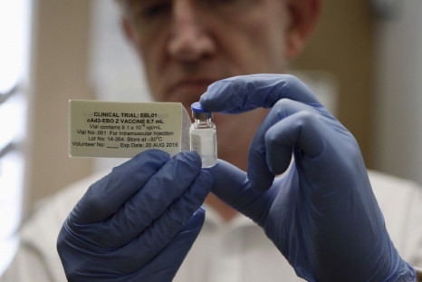 Professor Adrian Hill, Director of the Jenner Institute, and Chief Investigator of the trials, holds a phial containing the Ebola vaccine at the Oxford Vaccine Group Centre for Clinical Vaccinology and Tropical Medicine (CCVTM) in Oxford, southern England