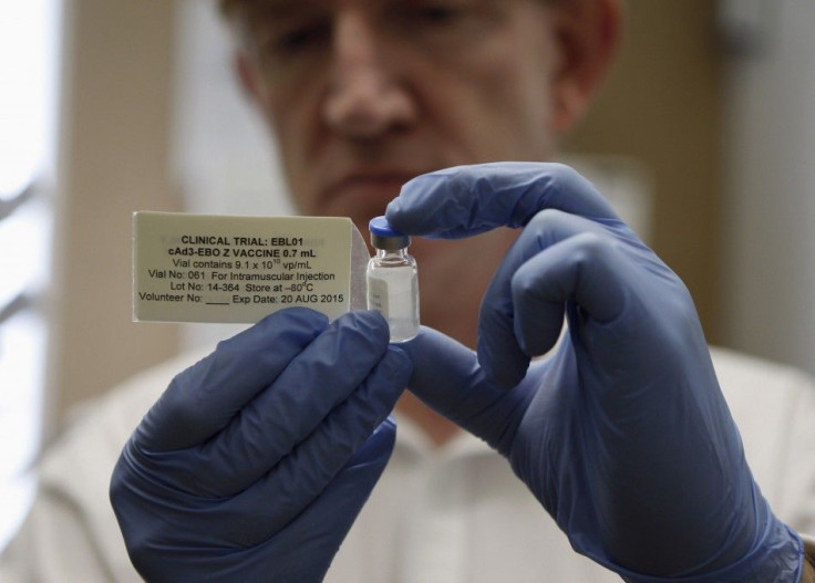 Professor Adrian Hill, Director of the Jenner Institute, and Chief Investigator of the trials, holds a phial containing the Ebola vaccine at the Oxford Vaccine Group Centre for Clinical Vaccinology and Tropical Medicine (CCVTM) in Oxford, southern England
