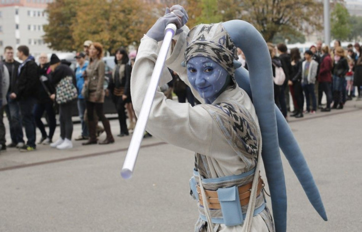 A woman dressed as a Star Wars character poses at the cartoon fair &quot;Vienna Comix&quot; in Vienna