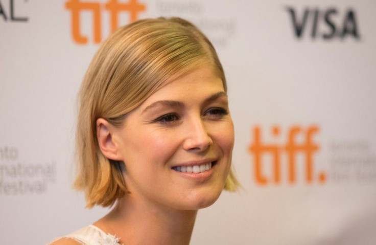 Cast member Rosamund Pike arrives for the "Hector and the Search for Happiness" gala at the Toronto International Film Festival (TIFF) in Toronto, September 7, 2014. REUTERS/Mark Blinch