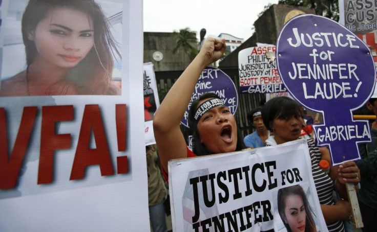 Protesters chant anti U.S. slogans during a rally against the killing of a 26-year-old Filipino transgender Jennifer Laude