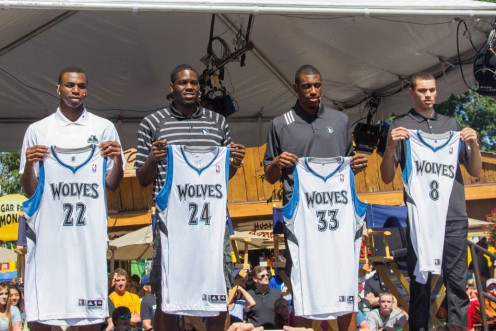 Aug 26, 2014; St. Paul, MN, USA; The newest Minnesota Timberwolves display their new jerseys (left to right) guard Andrew Wiggins, forward Anthony Bennett, forward Thaddeus Young, and guard Zach LaVine at Minnesota State Fair.