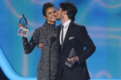 Nina Dobrev and Ian Somerhalder accept the award for favorite on-screen chemistry for their show &quot;The Vampire Diaries&quot; at the 2014 People&#039;s Choice Awards in Los Angeles, California January 8, 2014.