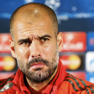 Bayern Munich&#039;s coach Pep Guardiola reacts during a news conference before their training session on the eve of their Champions League Group E match against CSKA Moscow in Moscow, September 29, 2014.