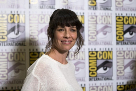 Cast member Evangeline Lilly poses at a press line for &quot;The Hobbit: The Battle of the Five Armies&quot;