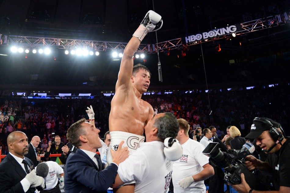 Jul 26, 2014 New York, NY, USA Gennady Golovkin white gloves reacts after knocking out Daniel Geale black gloves during their middleweight championship bout at Madison Square Garden. Golovkin won via third round knockout