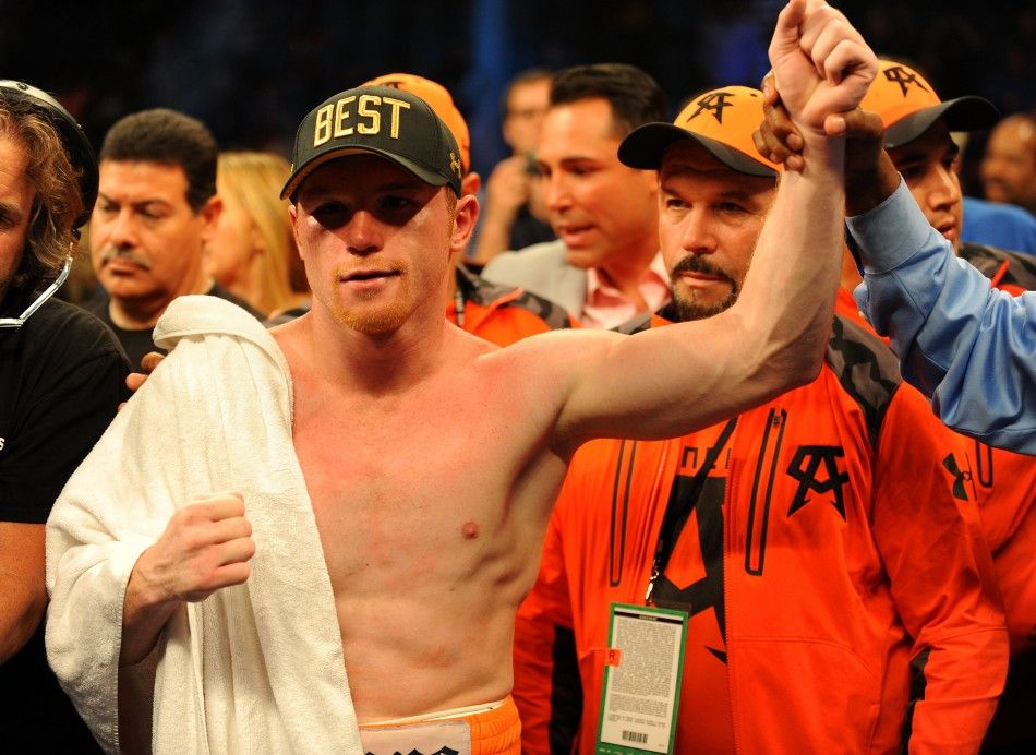 Jul 12, 2014 Las Vegas, NV, USA Canelo Alvarez is named the victor over Erislandy Lara after a 12-round super welterweight bout at MGM Grand