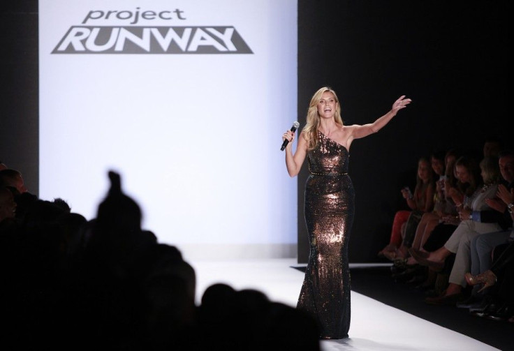 Project Runway judge Heidi Klum waves to the crowd following the Project Runway Spring 2014 collection show at New York Fashion Week September 6, 2013.