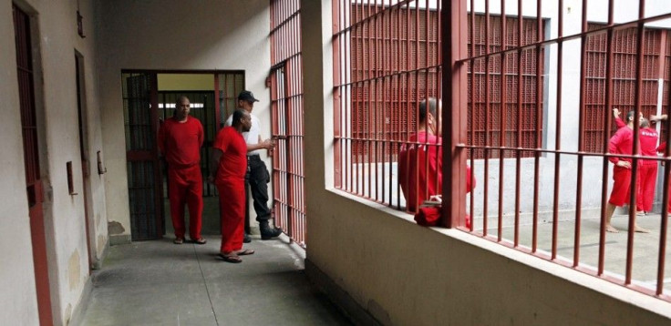 Prisoners leave the cell where they knit creations for Brazilian fashion designer Raquell Guimaraes in the Arisvaldo de Campos Pires maximum security penitentiary in Juiz de Fora, about 100 miles (160 km) north of Rio de Janeiro, May 29, 2013. When Guimar