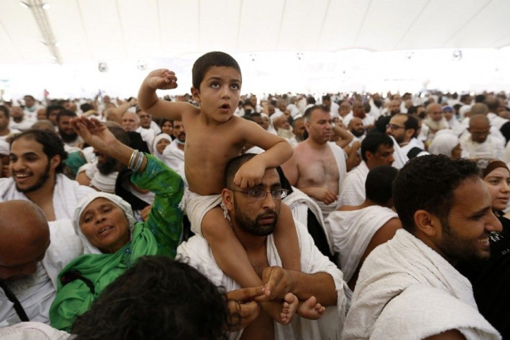 Muslim pilgrims arrive to cast stones at pillars symbolizing Satan, during the annual haj pilgrimage, on the first day of Eid al-Adha in Mina, near the holy city of Mecca, October 4, 2014. Muslims around the world celebrate Eid al-Adha to mark the end of 