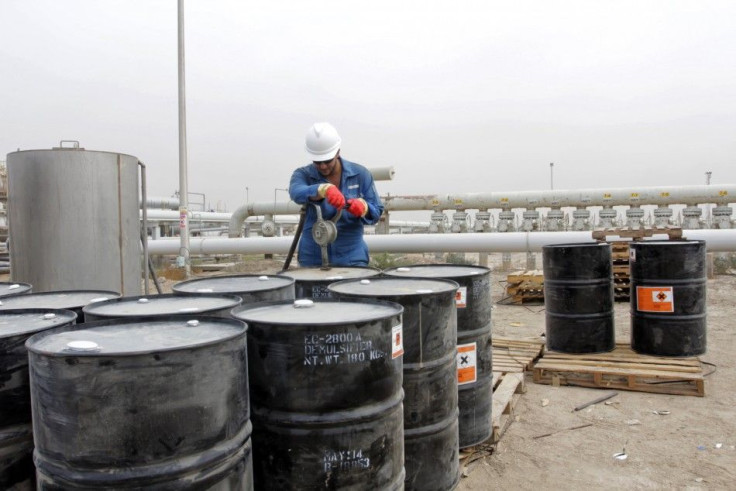 A man works at the West Qurna oilfield in southern Basra October 13, 2014. 