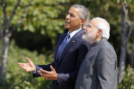 U.S. President Barack Obama and India's Prime Minister Narendra Modi talk at the National Martin Luther King Memorial on the National Mall in Washington September 30, 2014.