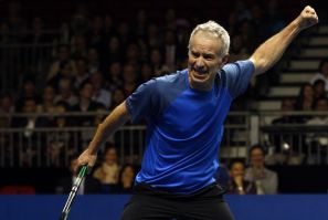 John McEnroe of the U.S. reacts after winning a point during his BNP Paribas Showdown friendly tennis match against compatriot Ivan Lendl in Hong Kong March 4, 2013. REUTERS/Tyrone Siu