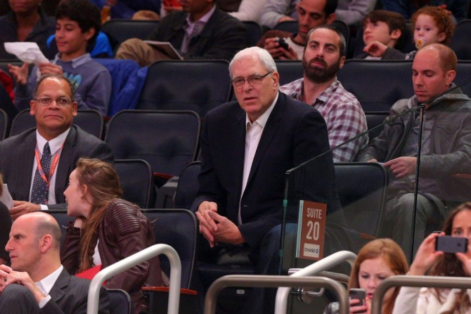 Oct 13, 2014; New York, NY, USA; New York Knicks president Phil Jackson watches the game against the Toronto Raptors during the first quarter at Madison Square Garden