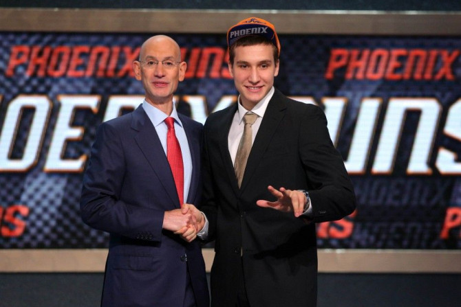 Jun 26, 2014; Brooklyn, NY, USA; Bogdan Bogdanovic (Serbia) poses for a photo with NBA commissioner Adam Silver after being selected as the number twenty-seven overall pick to the Phoenix Suns in the 2014 NBA Draft at the Barclays Center.
