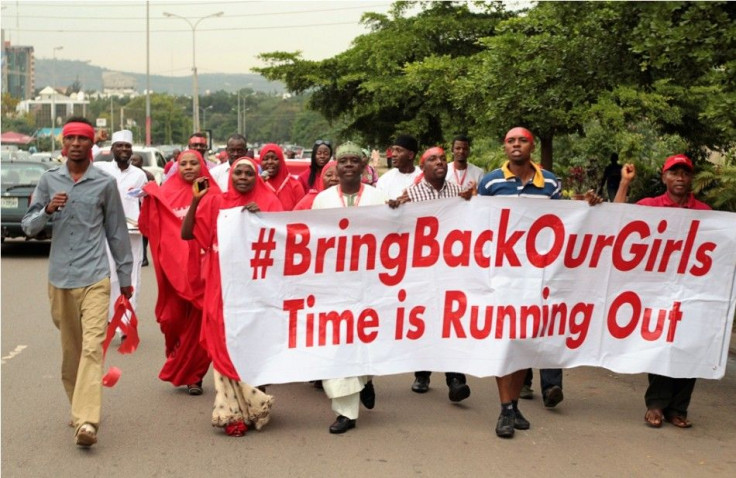 Campaigners from &quot;#Bring Back Our Girls&quot; march during a rally calling for the release of the Abuja school girls