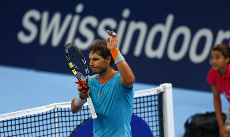 Rafael Nadal of Spain reacts after winning his match against France's Pierre-Hugues Herbert at the Swiss Indoors ATP tennis tournament in Basel October 22, 2014. REUTERS/Arnd Wiegmann