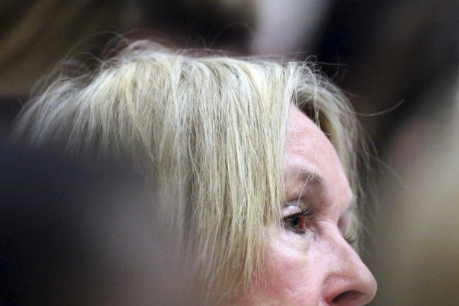 June Steenkamp, mother of Reeva Steenkamp, attends the sentencing hearing of South African Olympic and Paralympic track star Oscar Pistorius at the North Gauteng High Court in Pretoria October 21, 2014. A South African court on Tuesday sentenced Pistorius
